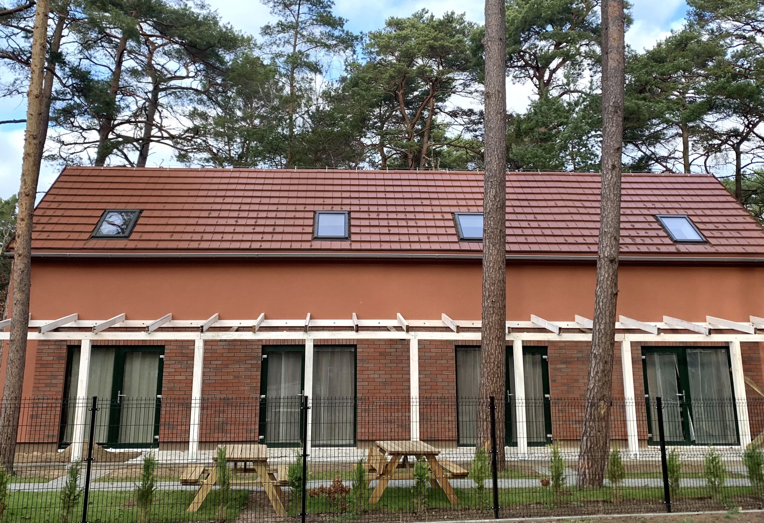 Domek Somimare pośród palm